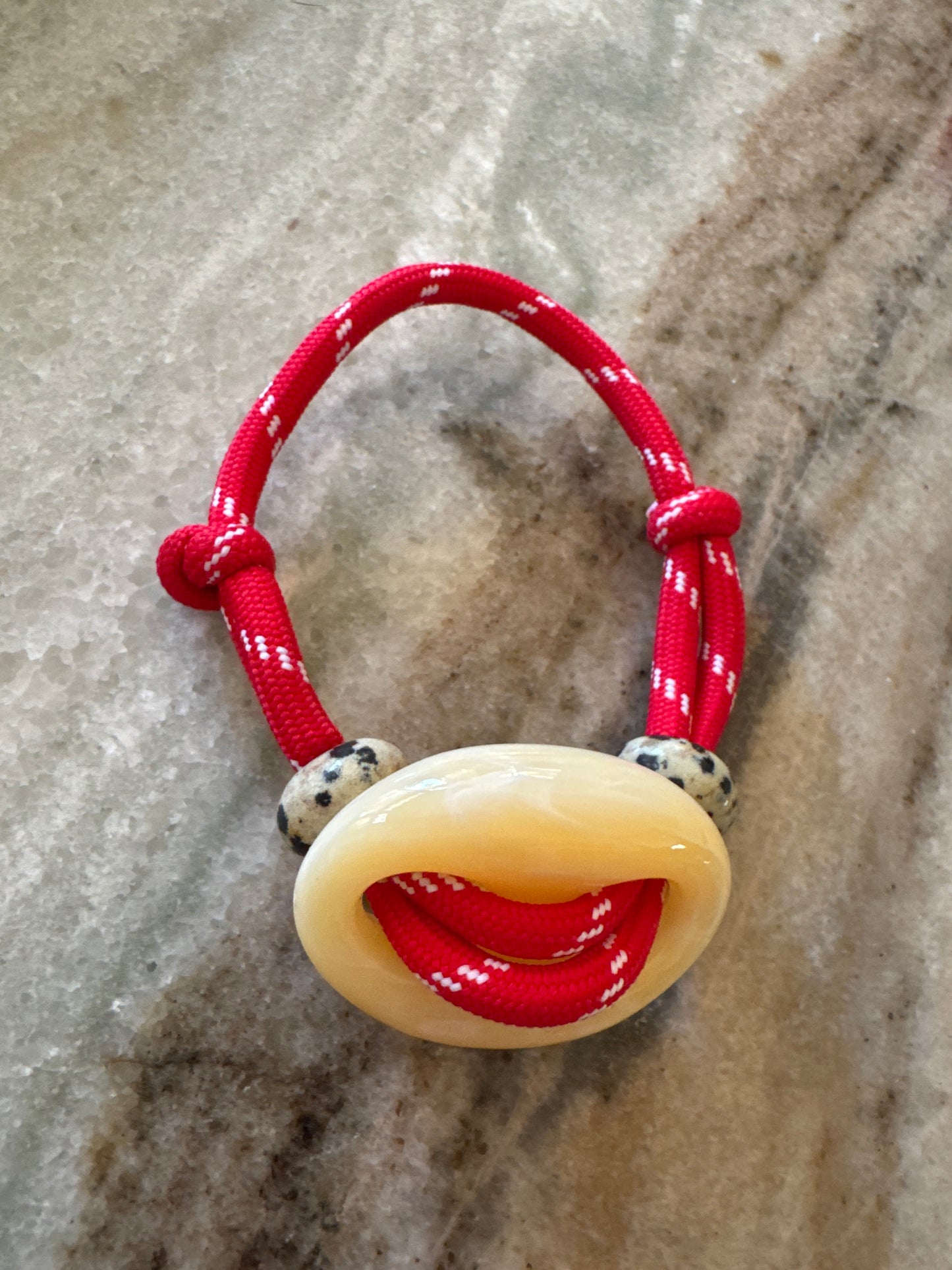 Armband knoop dalmation stone